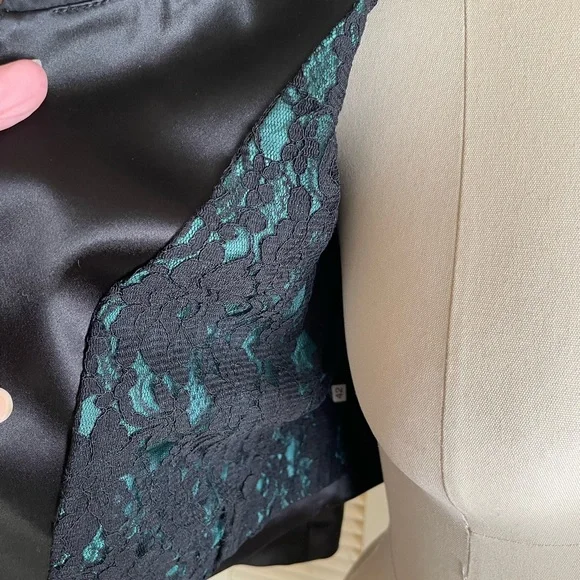 Maria Grazia Severti black taffeta shirt jacket with green accentbow